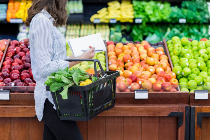 0_Unrecognizable-woman-shops-for-produce-in-supermarket